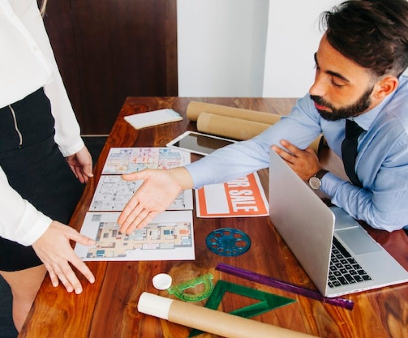 real-estate-businessman-reaching-out-hand_23-2147653314