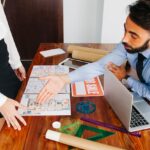 real-estate-businessman-reaching-out-hand_23-2147653314